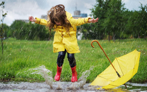 playing in the rain, kids playing in the rain, rainy day play, rainy day fun